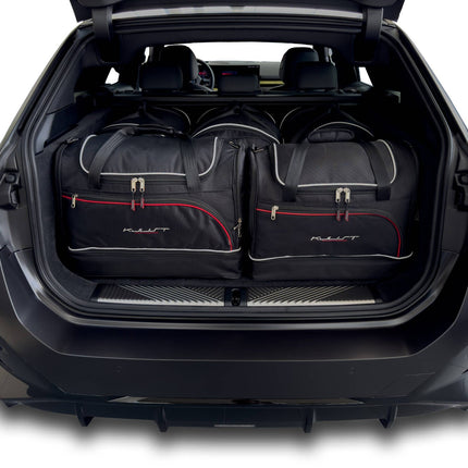 Kjust Kjust Reistassenset voor BMW i5 Touring vanaf 2023 - Set van 5 Tassen met 3 Roltassen en 2 Sporttassen Harvest Automotive 1