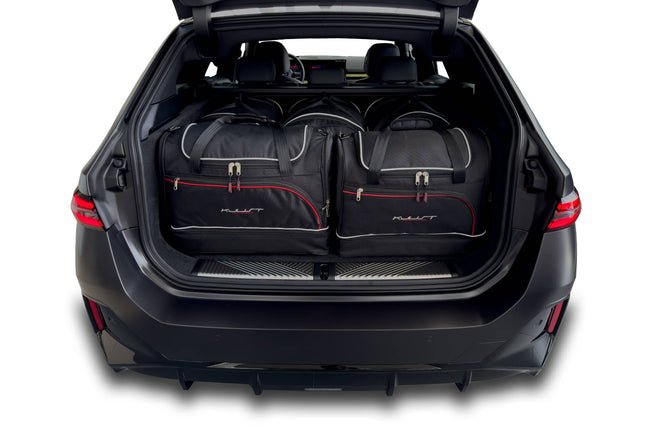 Kjust Kjust Reistassenset voor BMW i5 Touring vanaf 2023 - Set van 5 Tassen met 3 Roltassen en 2 Sporttassen Harvest Automotive 1