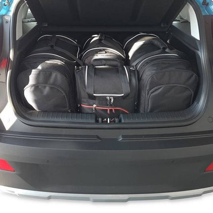 Kjust Kjust Reistassenset voor Hyundai Bayon vanaf 2021 - Set van 4 Tassen met 2 Roltassen 1 Sporttas en 1 Vliegtuigtas Harvest Automotive 1
