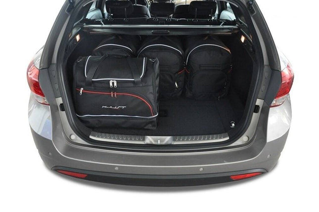 Kjust Kjust Reistassenset voor Hyundai i40 Tourer vanaf 2011 - Set van 5 Tassen met 3 Roltassen en 2 Sporttassen Harvest Automotive 2