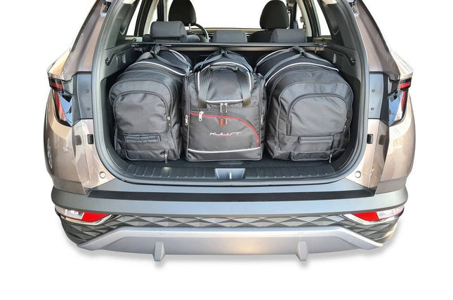 Kjust Kjust Reistassenset voor Hyundai Tucson vanaf 2020 - Set van 4 Tassen met 2 Roltassen 1 Sporttas en 1 Vliegtuigtas Harvest Automotive 1