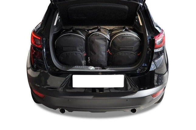 Kjust Kjust Reistassenset voor Mazda CX-3 vanaf 2015 - Set van 3 Tassen met 2 Roltassen en 1 Sporttas Harvest Automotive 1