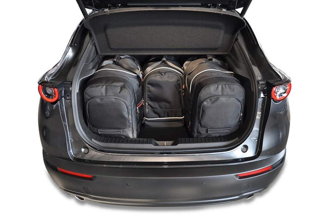 Kjust Kjust Reistassenset voor Mazda CX-30 vanaf 2019 - Set van 4 Tassen met 2 Roltassen 1 Sporttas en 1 Vliegtuigtas Harvest Automotive 2