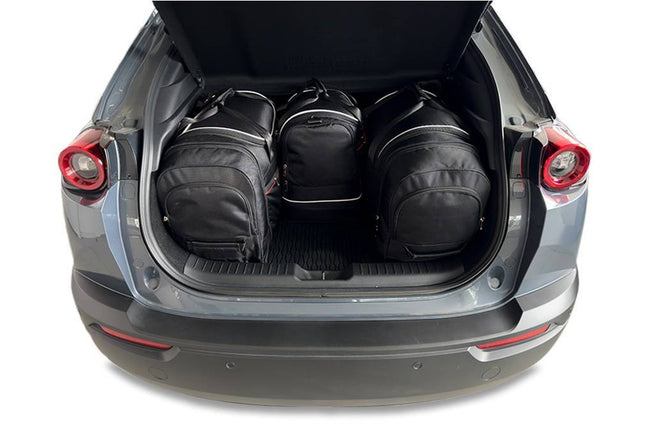 Kjust Kjust Reistassenset voor Mazda MX-30 vanaf 2022 - Set van 4 Tassen met 2 Roltassen 1 Sporttas en 1 Vliegtuigtas Harvest Automotive 2