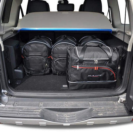 Kjust Kjust Reistassenset voor Mitsubishi Pajero 2000-2006 - Set van 5 Tassen met 3 Roltassen en 2 Sporttassen Harvest Automotive 2