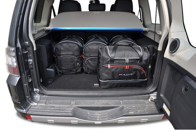 Kjust Kjust Reistassenset voor Mitsubishi Pajero 2000-2006 - Set van 5 Tassen met 3 Roltassen en 2 Sporttassen Harvest Automotive 2