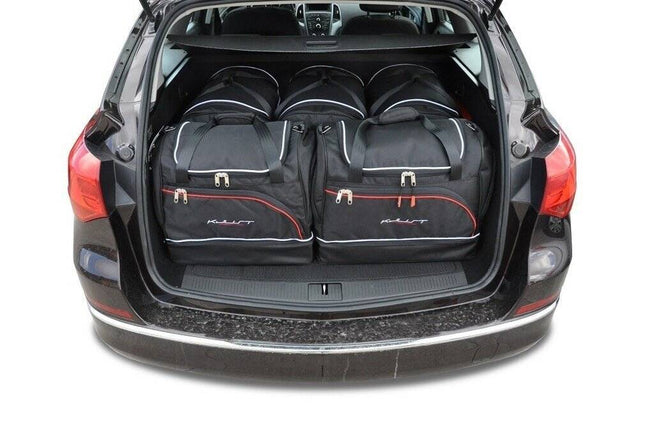 Kjust Kjust Reistassenset voor Opel Astra Sports Tourer 2010-2015 - Set van 5 Tassen met 3 Roltassen en 2 Sporttassen Harvest Automotive 1