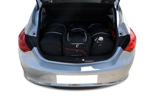 Kjust Reistassenset voor Opel Astra 5-deurs 2009-2015 - Set van 4 Tassen met 2 Roltassen en 2 Sporttassen