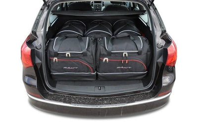 Kjust Reistassenset voor Opel Astra Sports Tourer 2010-2015 - Set van 5 Tassen met 3 Roltassen en 2 Sporttassen