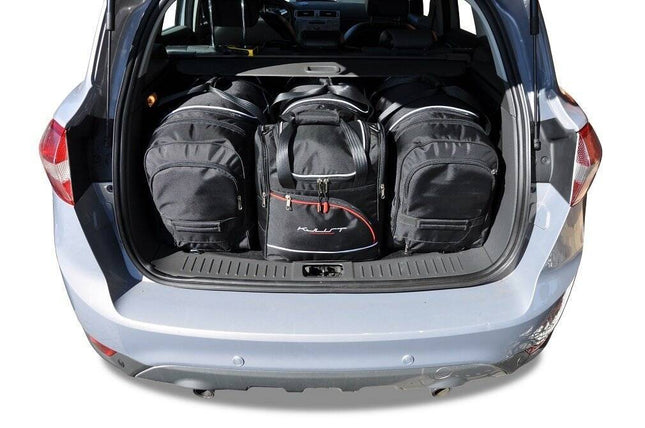 Kjust Reistassenset voor Ford Kuga 2008-2013 - Set van 4 Tassen met 2 Roltassen 1 Sporttas en 1 Vliegtuigtas