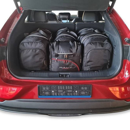 Kjust Reistassenset voor Ford Mustang Mach-E vanaf 2021 - Set van 4 Tassen met 2 Roltassen en 2 Sporttassen